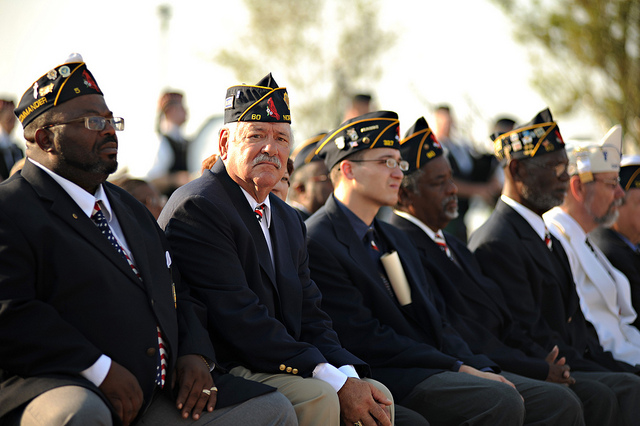 Veterans sitting in attendance for a 9/11 remembrance parade.