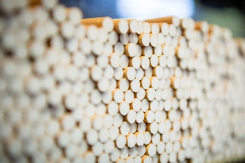 A pile of cigarettes ready for packaging