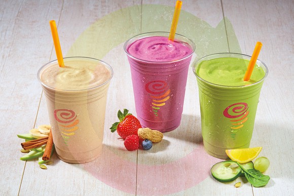 Three Jamba Juice smoothies on display.