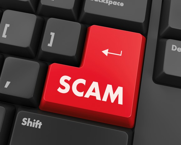 Keyboard with Scam key in red.