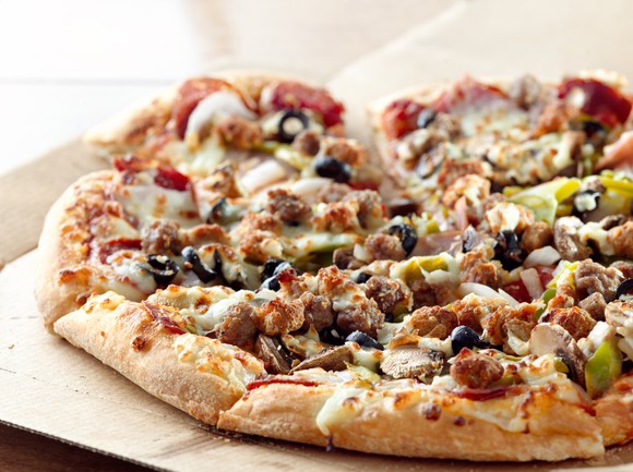 Pizza in delivery box.