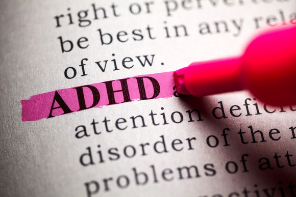 Book text with ADHD highlighted in pink