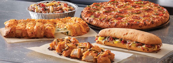 Various Domino's products on a table.