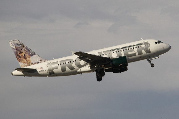 Frontier Airlines plane in flight.
