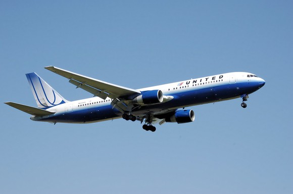 United Airlines plane in flight.