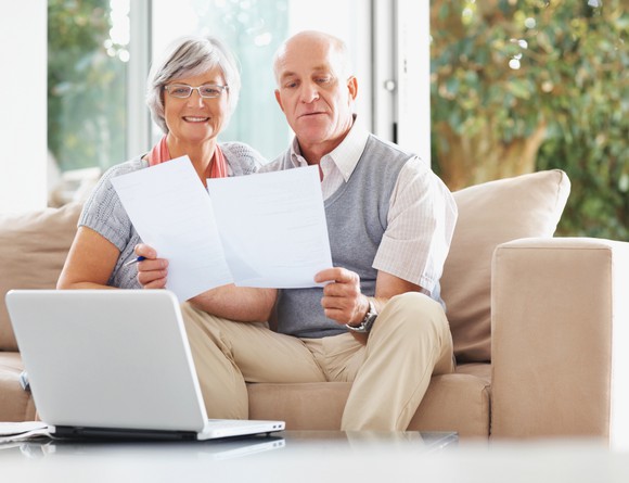 Older couple looking at documents