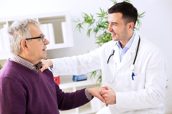 Older patient with doctor