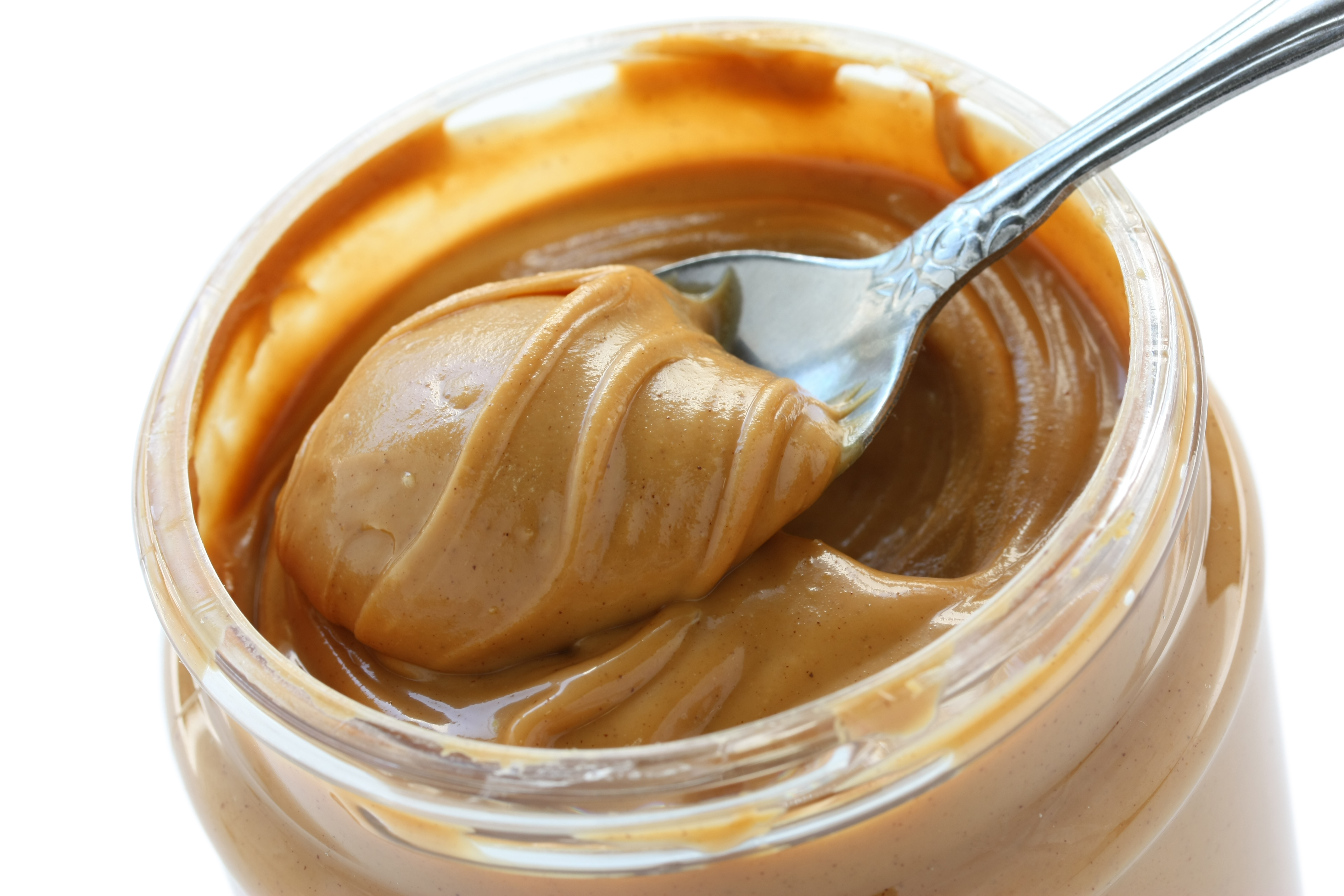 A spoon in a jar of peanut butter. Conagra's brands include Peter Pan peanut butter.