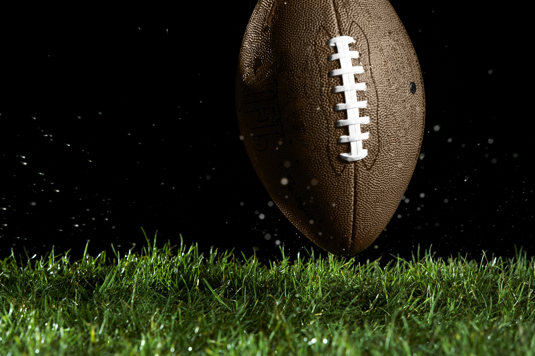 A football on turf.
