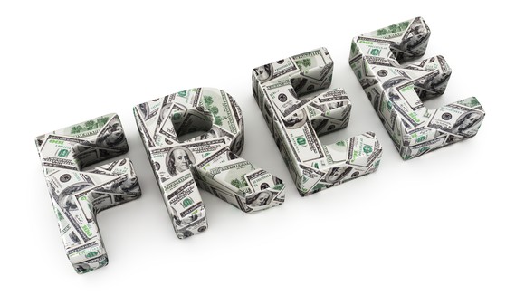 Word FREE made from dollar banknotes on white background