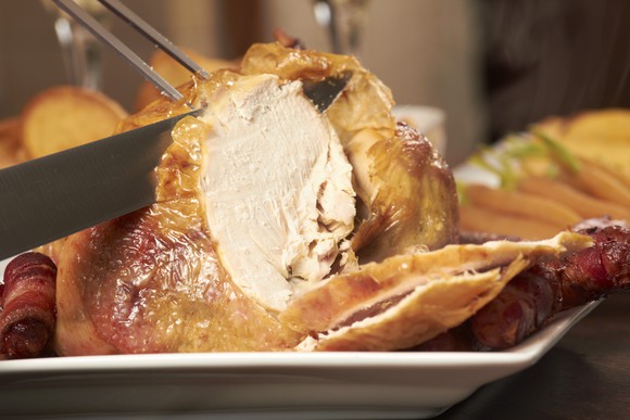 Turkey breast getting carved