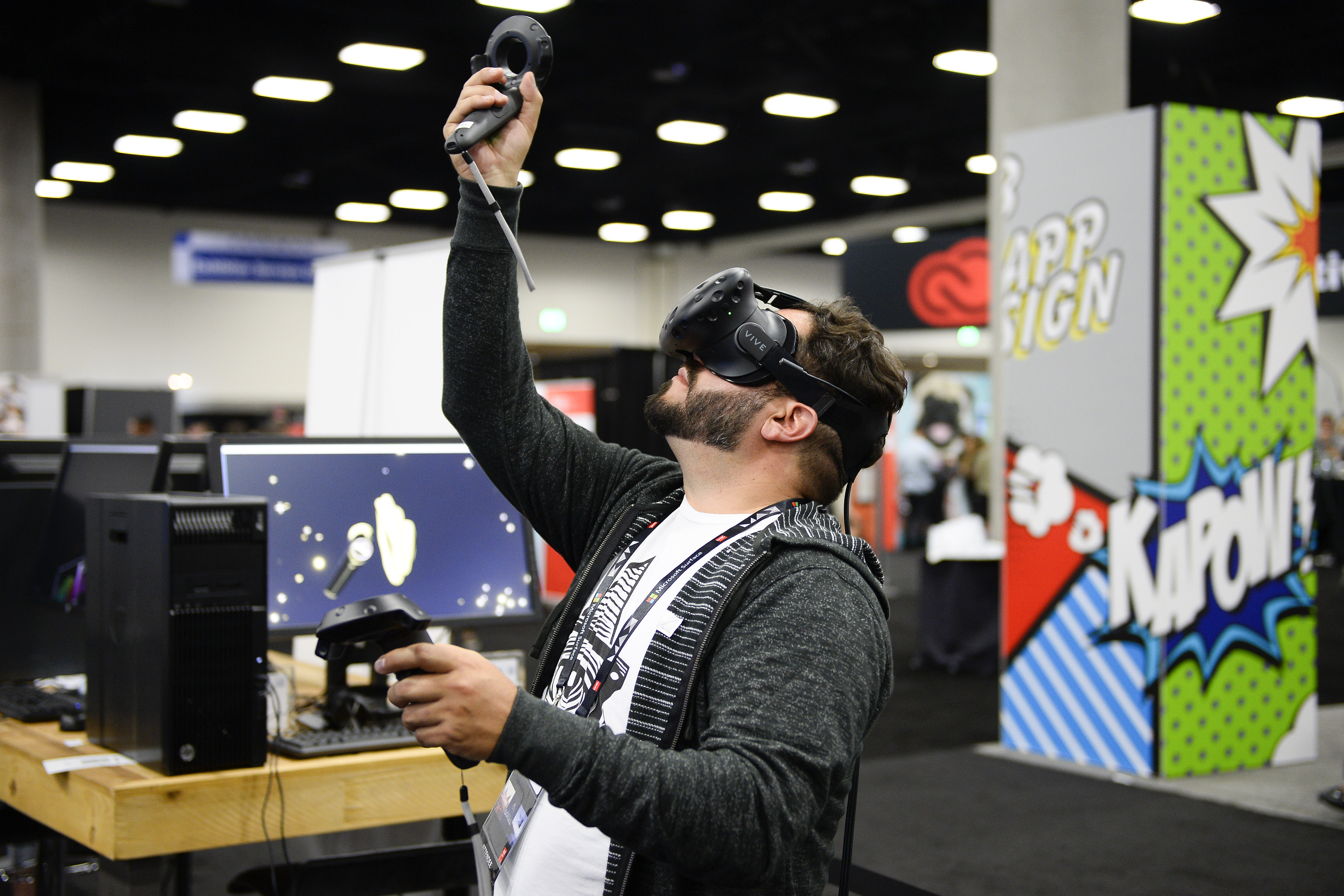 A man wearing a virtual-reality headset looks overhead.