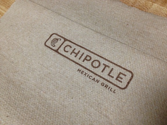 A napkin with the Chipotle logo on it