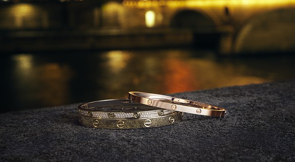 Cartier rings on a table