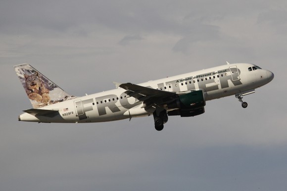 A Frontier Airlines plane in flight.