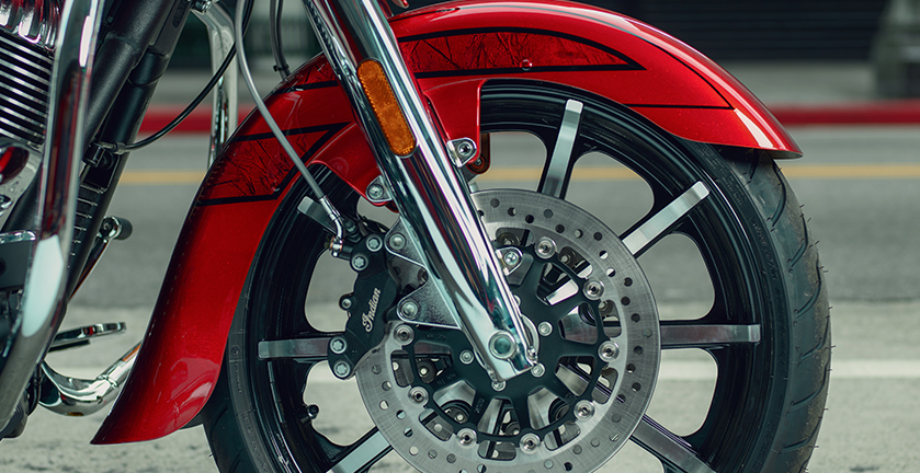 Wheel detail of Indian Motorcycle's new Chieftain Elite showing open fender and aluminum-cast wheel