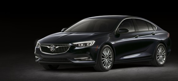 The new Regal Sportback, a 4-door car with a hatch-like rear, is shown against a dark background.