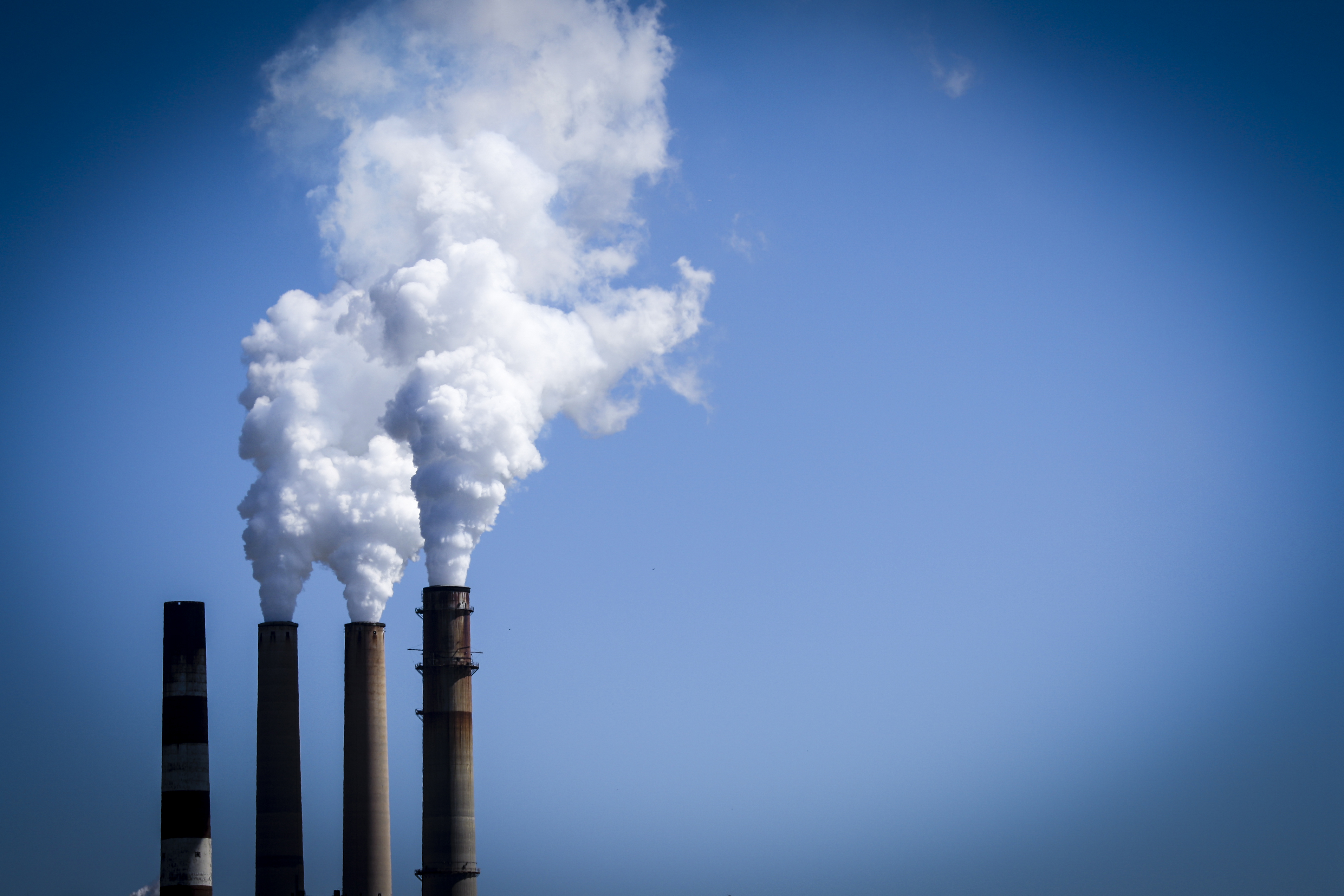 Steam rises from a power plant.