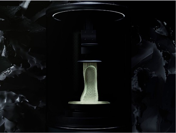 A Futurcraft 4D midsole being 3D-printed.