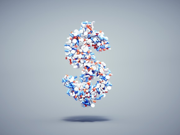 Dollar sign made of pills