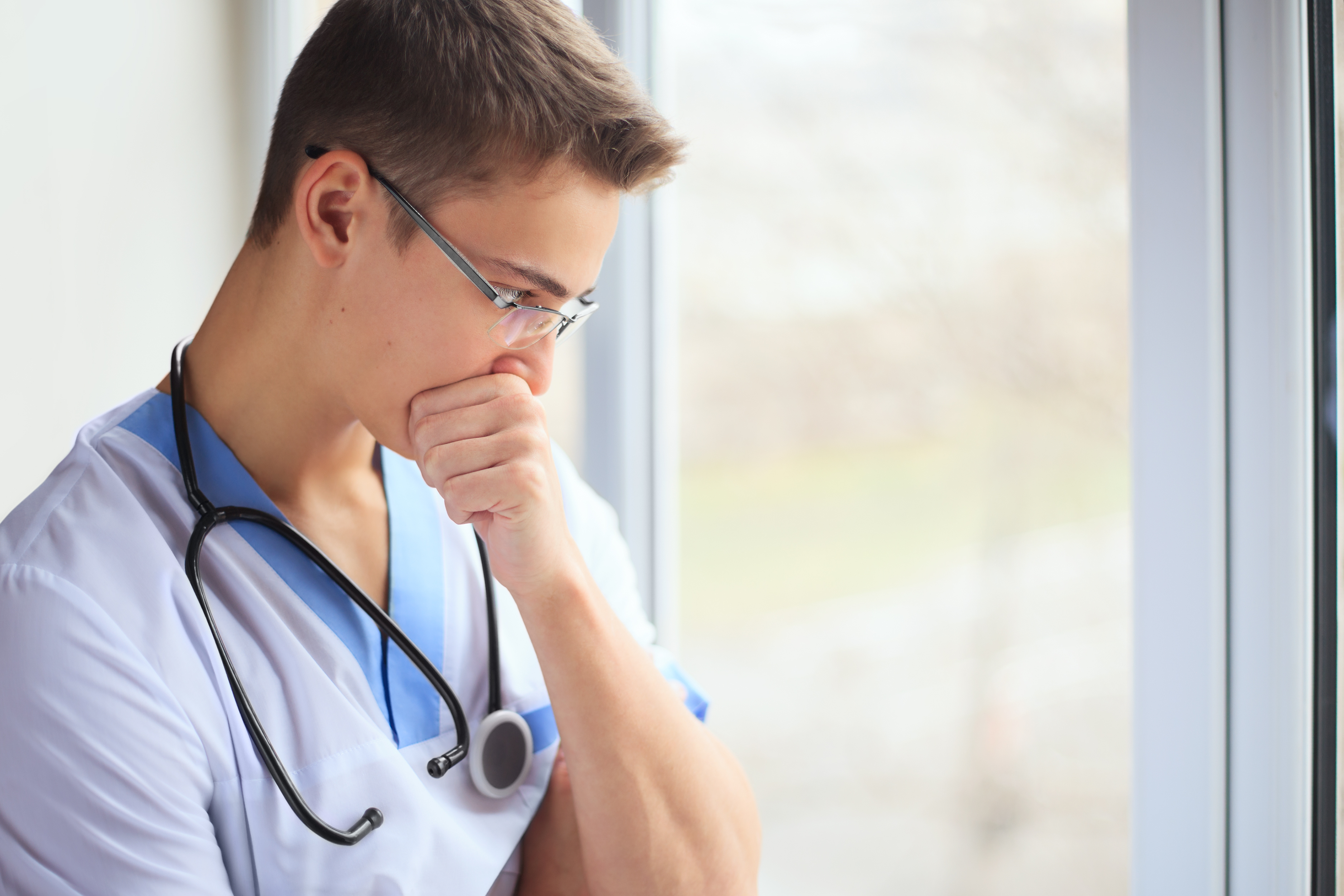 A physician looking concerned