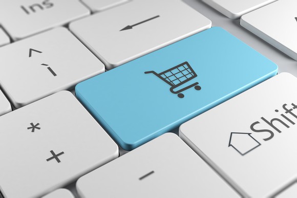 A keyboard image with a shopping cart, connoting e-commerce.