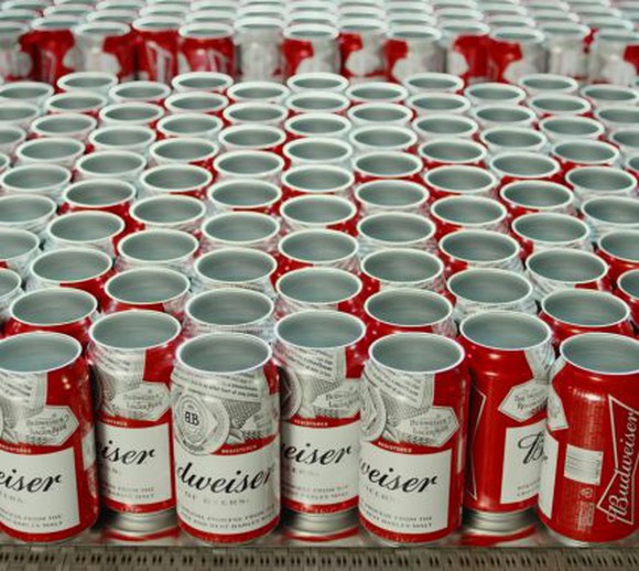 Cans of Budweiser waiting to be filled