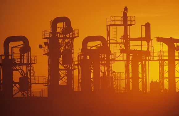Oil refinery at sunset