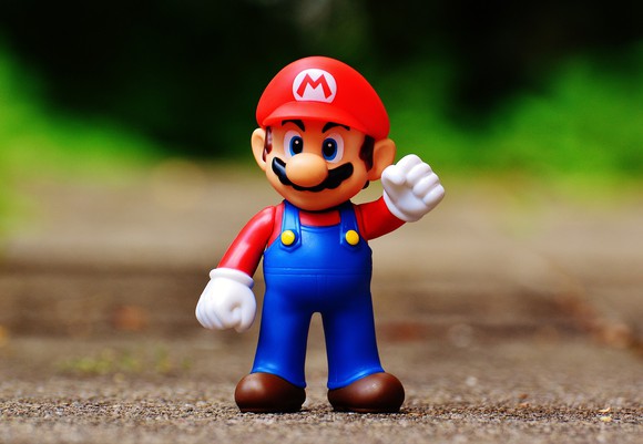 Toy figure of Nintendo's Mario character.