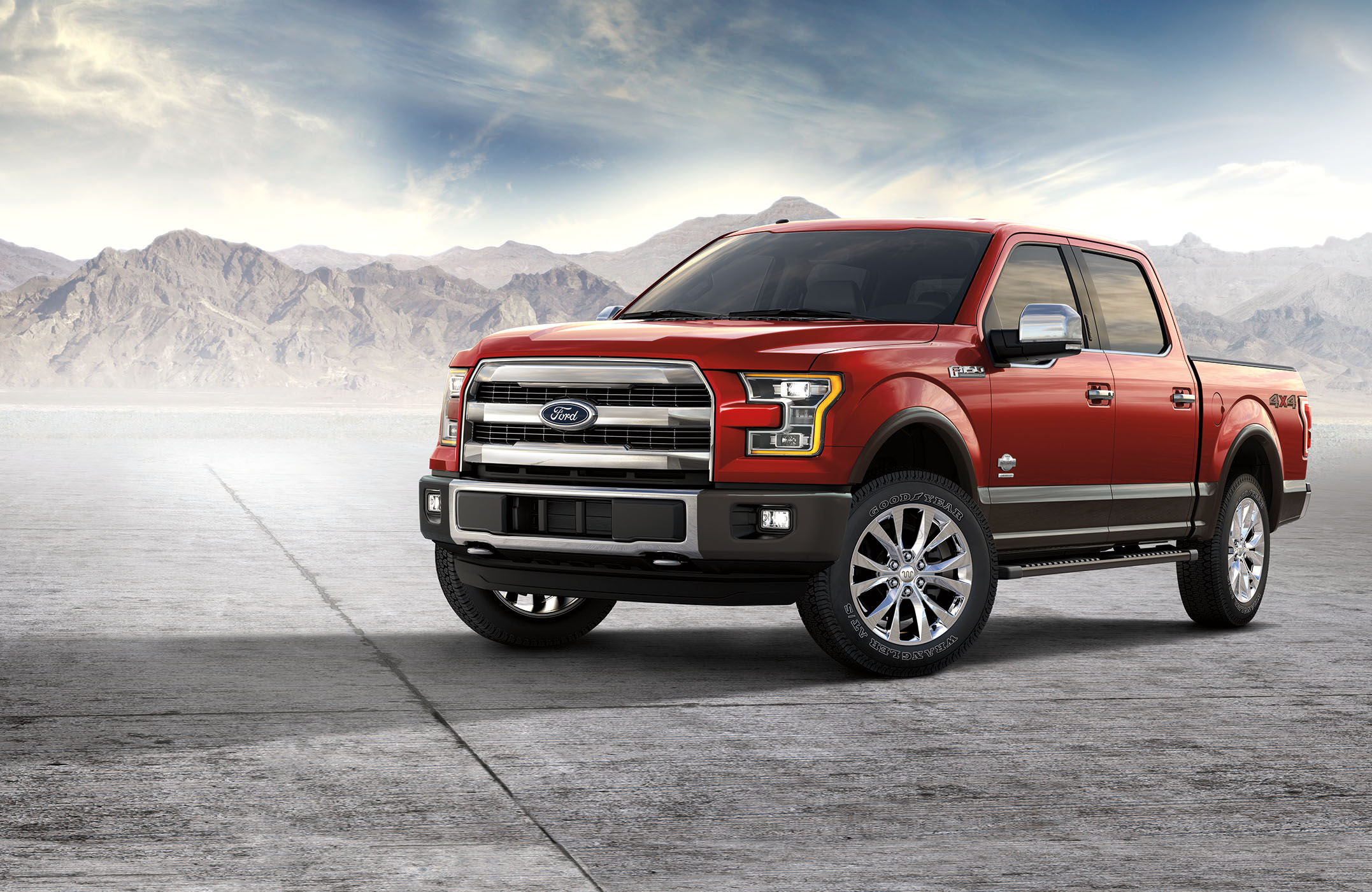 A red Ford F-150 King Ranch pickup.