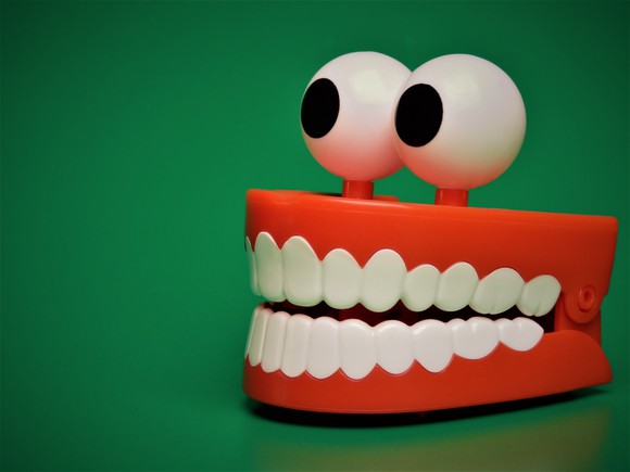 Toy chattering teeth with googly eyes on top