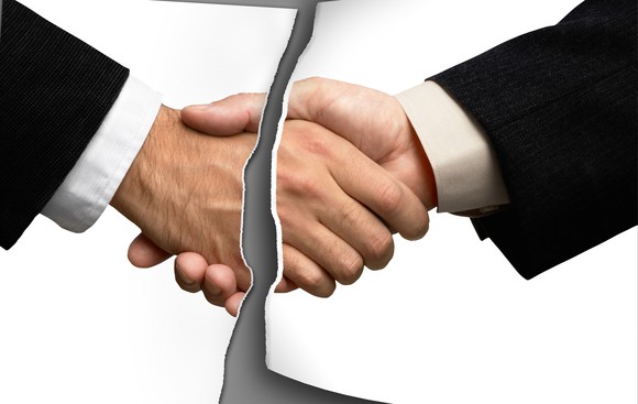 Handshake torn apart