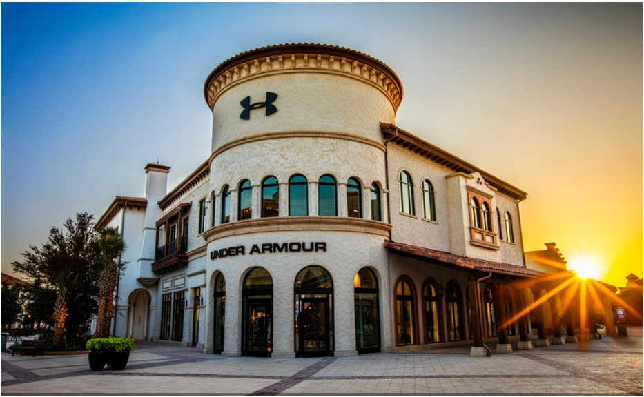 Sun rising over Under Armour "Brand House" retail store.