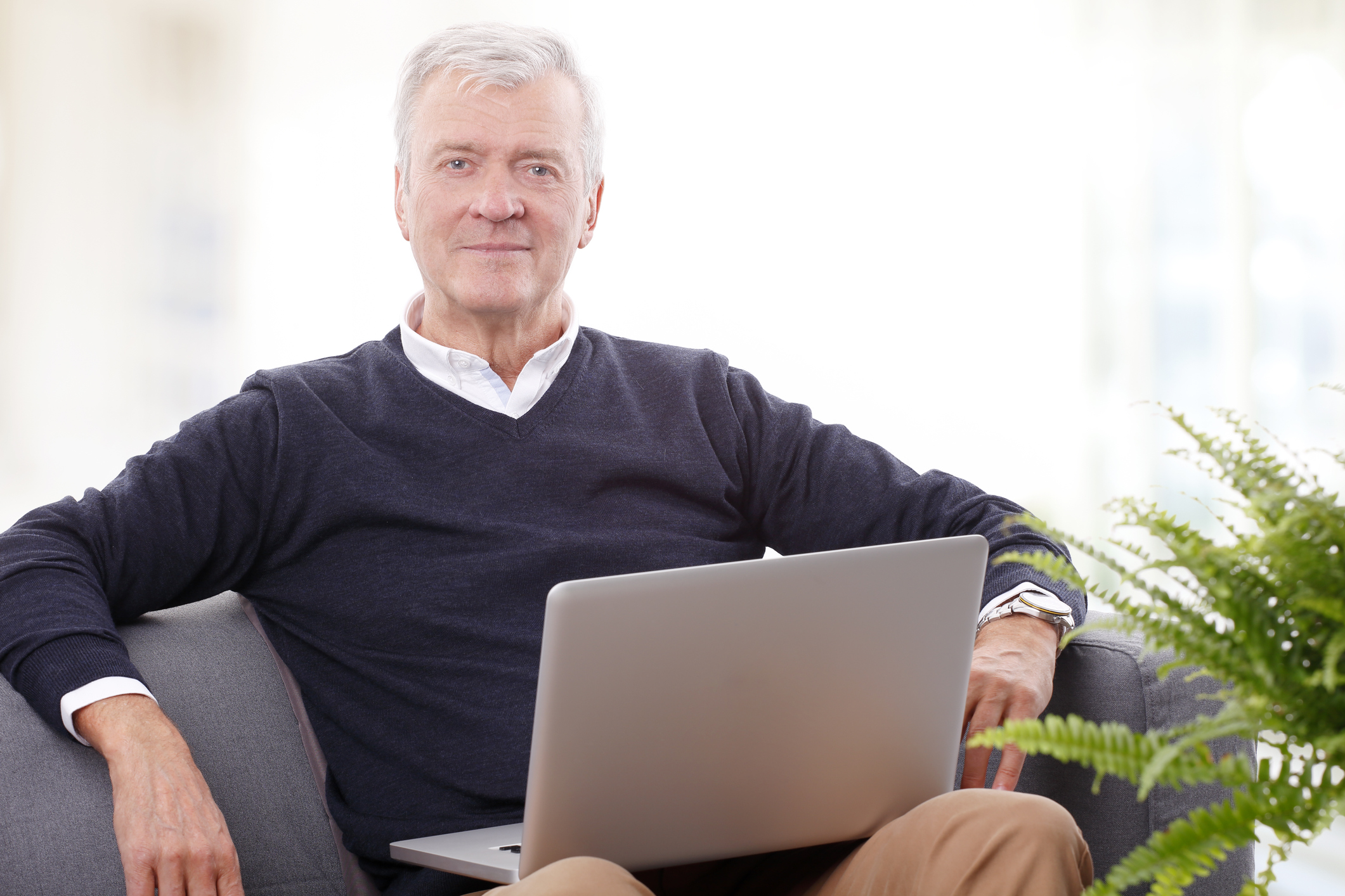 Senior male with laptop