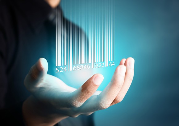 Hand grasping digital representation of barcode