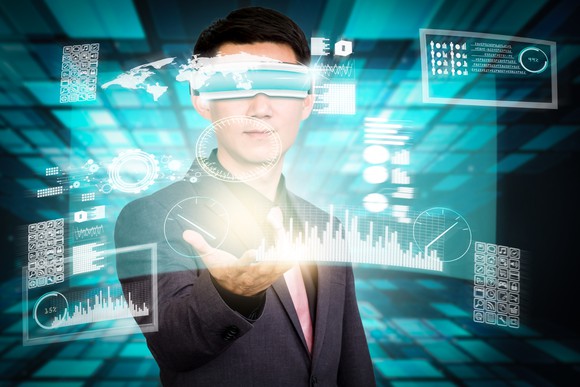 Man standing amid digital abstract technology
