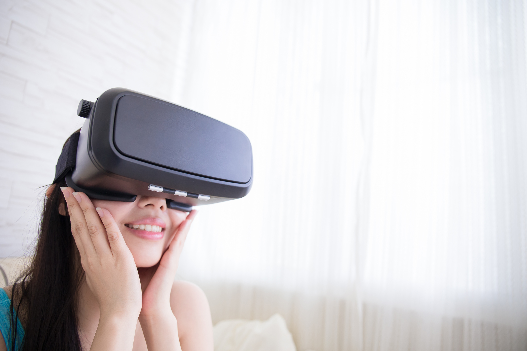 Woman wearing a VR headset.