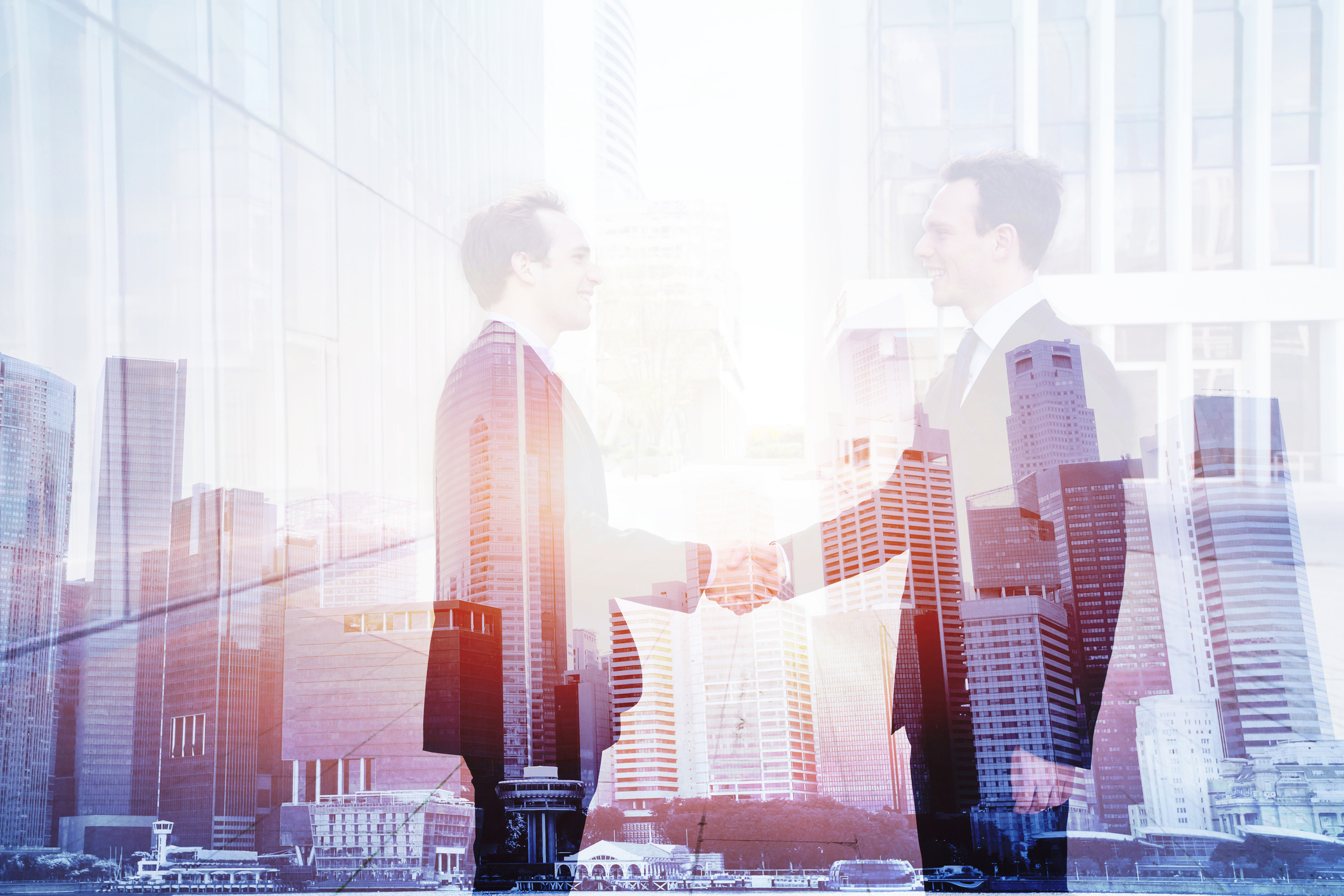 A business deal with handshake.