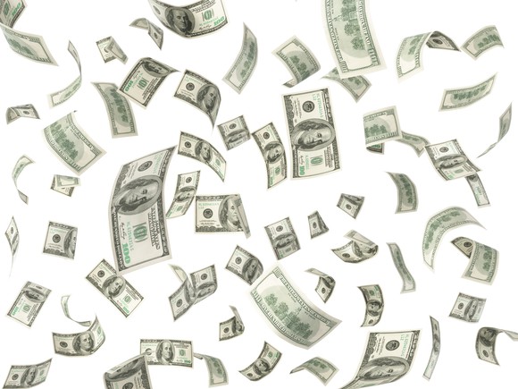 Currency floating in the air.