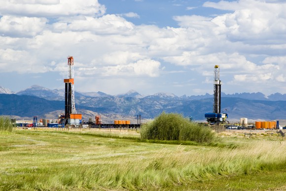 Two oil-drilling rigs in the field