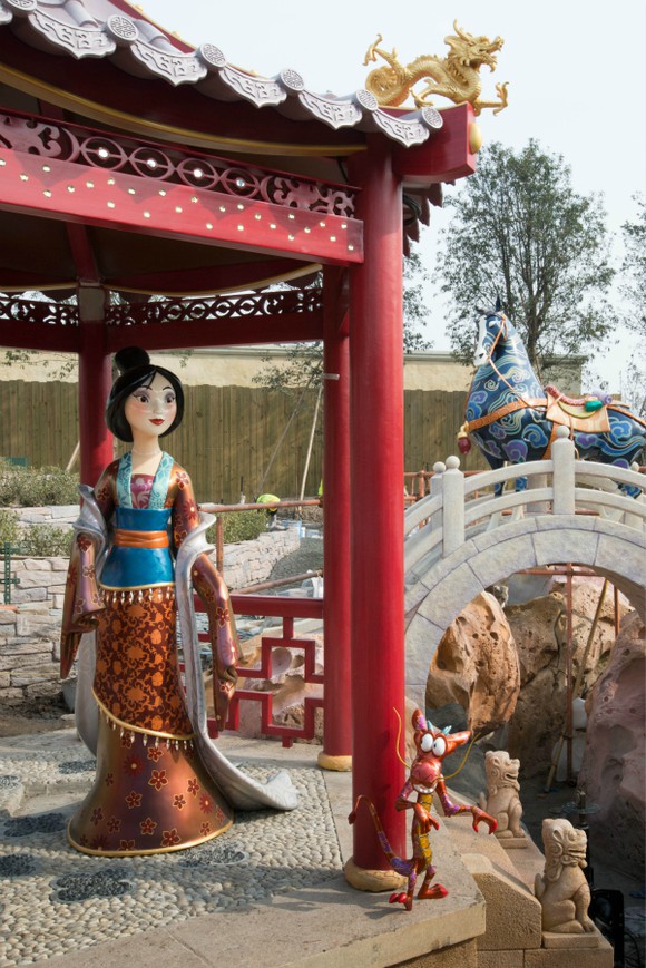 Mulan stands inside a pagoda at Disney's Shanghai resort.