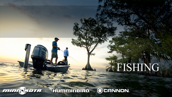 A father and son fishing on a boat