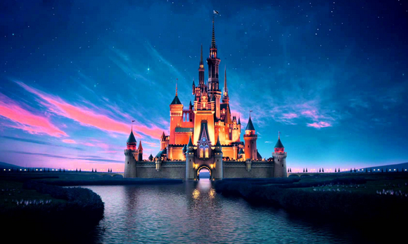 Exterior view of Cinderella's Castle at Disney World at night.