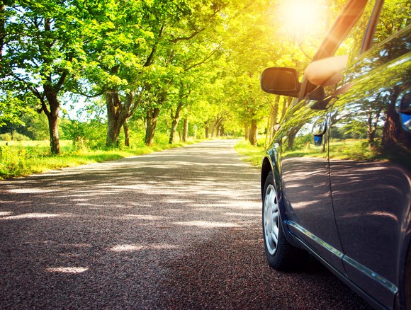 Car driving down a road