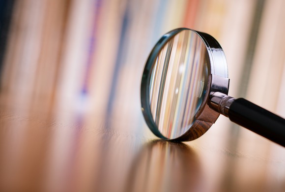 A magnifying glass on a table.