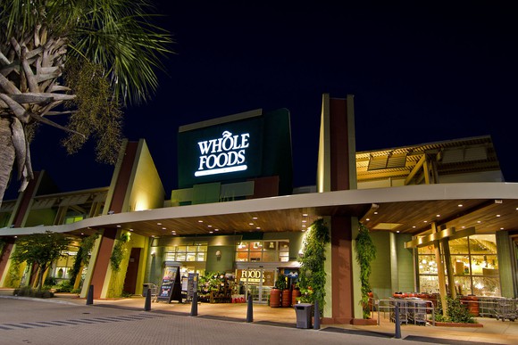Night exterior shot of a Whole Foods store.