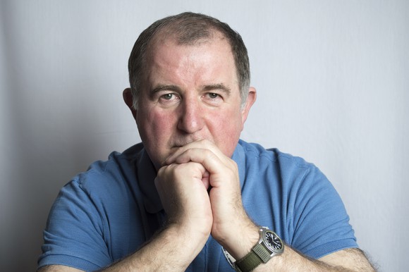 Serious-looking older man