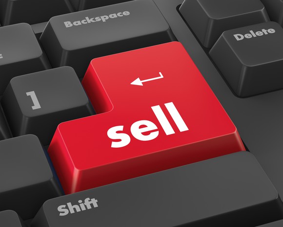 Computer keyboard with a red sell button