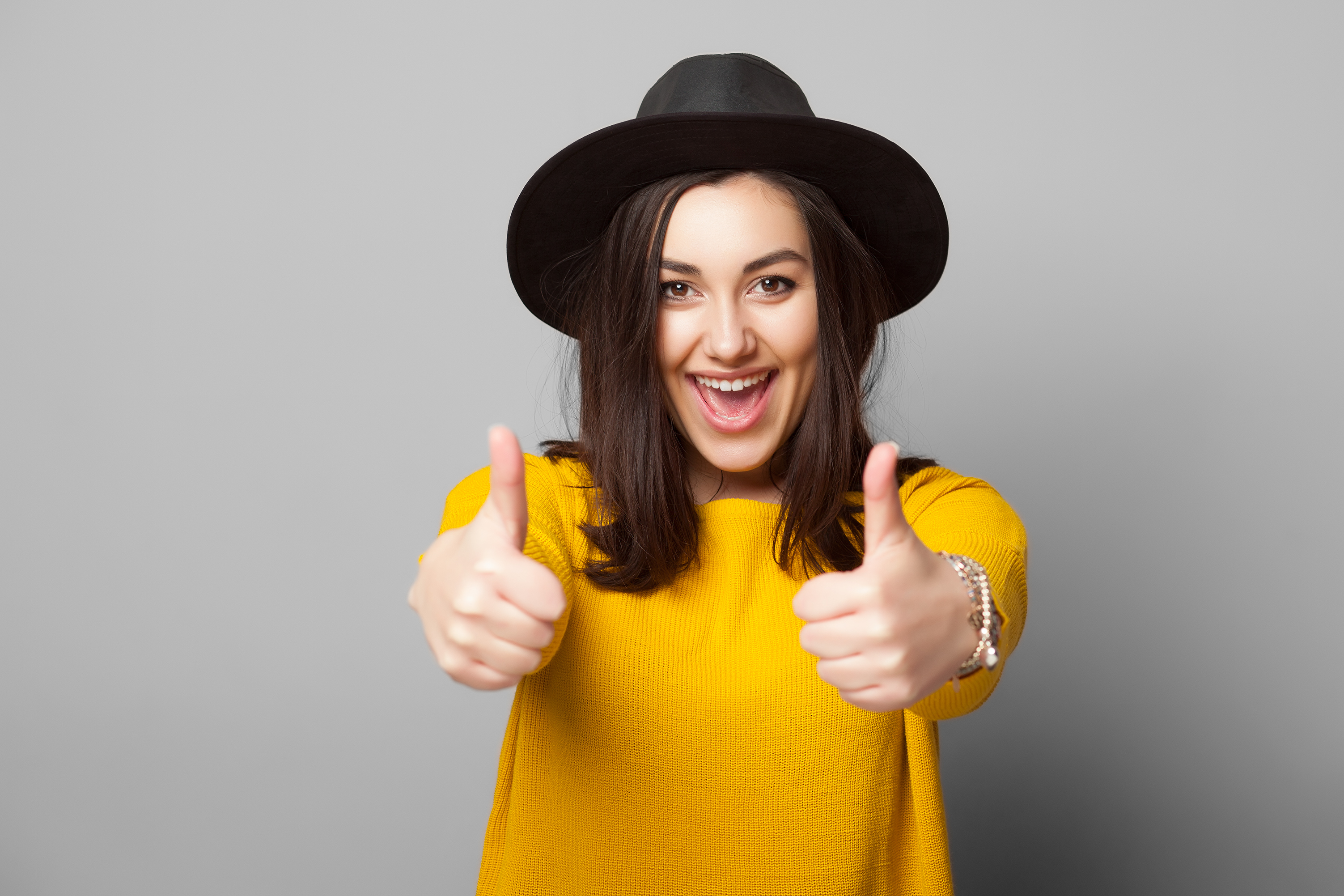 woman happy thumbs up GettyImages-513124742