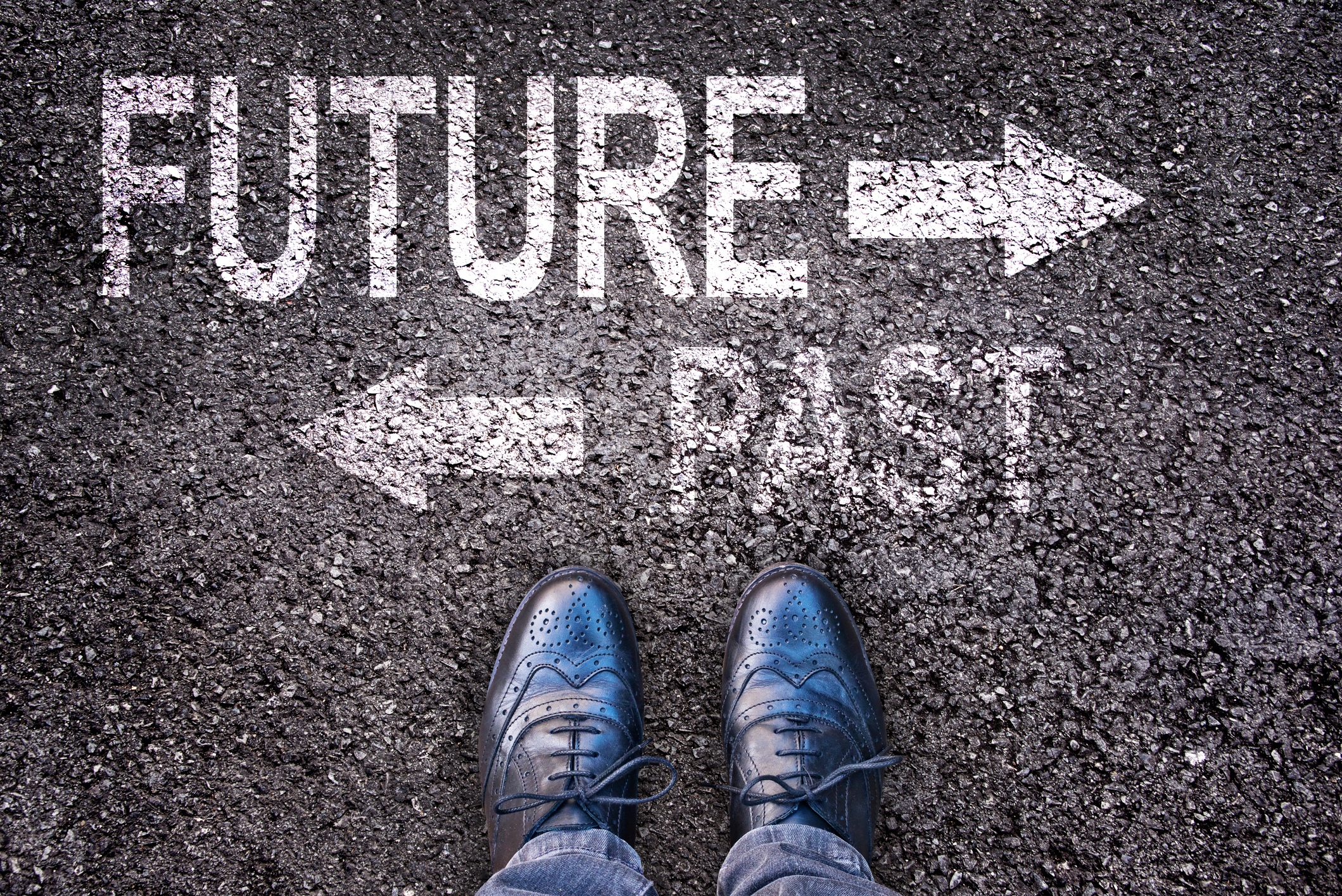 One arrow points to the future, while one points the opposite directions to the past, with feet perpendicular.
